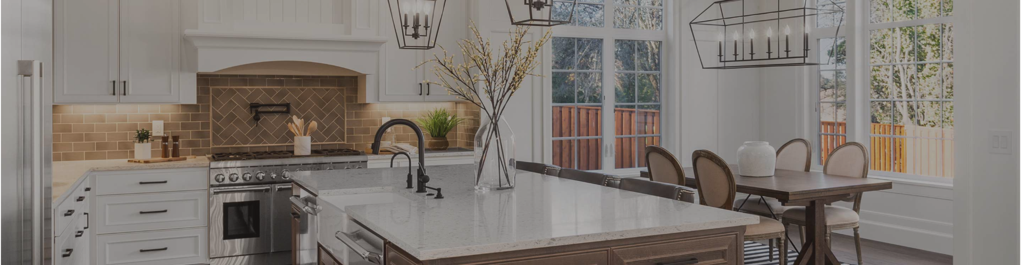 Kitchen with wood-look flooring and a tile backsplash